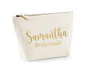 Stylish and durable canvas makeup bag with customizable monogram, perfect for organizing cosmetics and toiletries on-the-go or at home. Spacious interior and secure zipper keep essentials organized and accessible. Great gift idea for Bridesmaids, beauty enthusiasts and travelers.