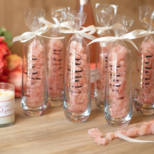 Load image into Gallery viewer, Personalized stemless Bridesmaid champagne flutes with champagne-flavored gourmet gummy bears and white satin bow. Ideal for bachelorette party favors and bridesmaid gifts.
