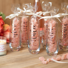 Load image into Gallery viewer, Personalized stemless Bridesmaid champagne flutes with champagne-flavored gourmet gummy bears and white satin bow. Ideal for bachelorette party favors and bridesmaid gifts.