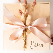 Load image into Gallery viewer, This engraved wooden keepsake box is the perfect gift for weddings, bridesmaid proposals, and brides-to-be. It comes with a satin ribbon in your color choice and an optional dried floral add-on for an extra touch of elegance. With ample space inside and a natural finish, this 10x10x5 inch personalized box is ideal for storing cherished memories and treasured keepsakes
