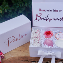 Load image into Gallery viewer, White box with &quot;Pauline&quot; on top. Message inside reads &quot;Thank you for being my bridesmaid.&quot; Box holds personalized champagne flute, compact mirror &amp; ring dish.
